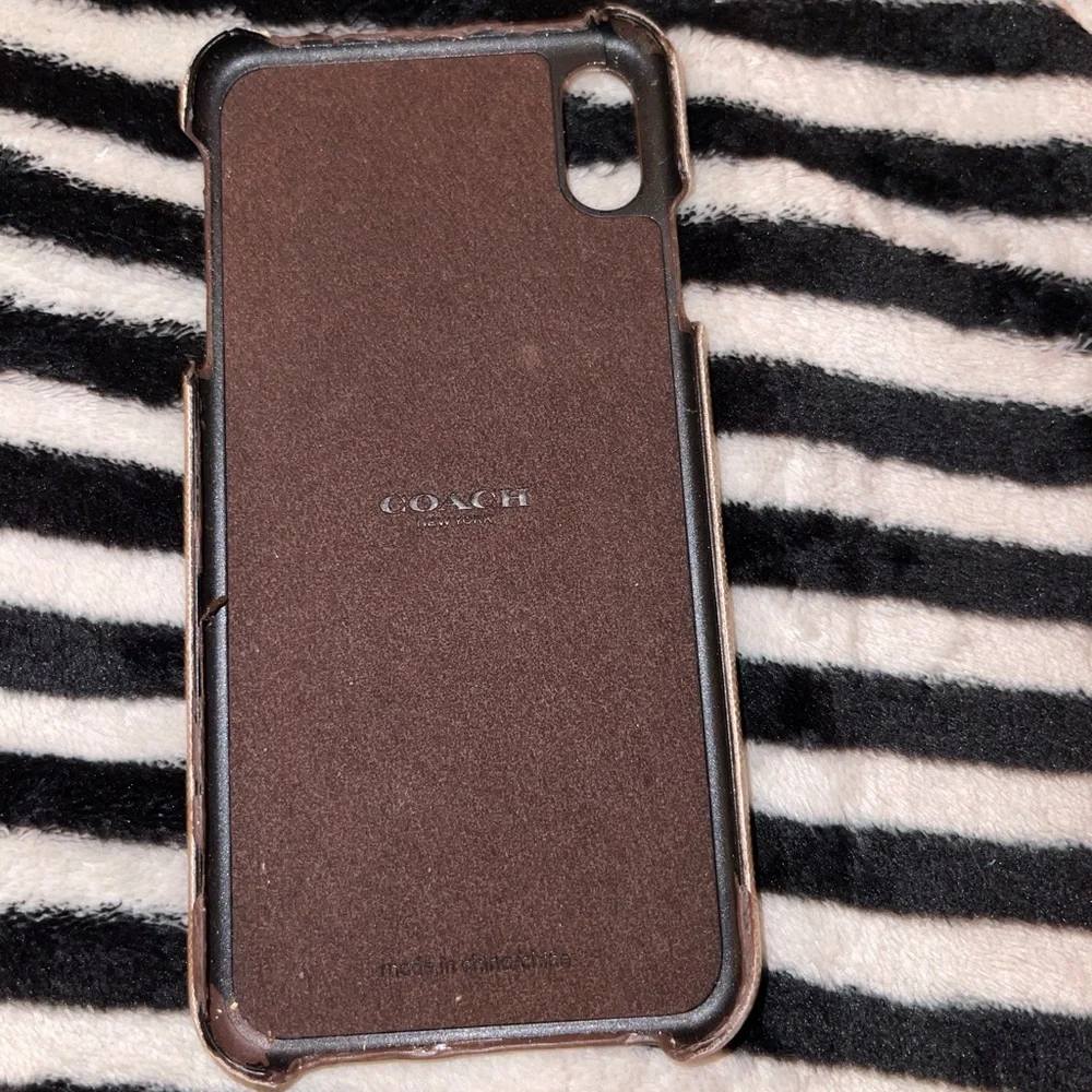 Coach AUTHENTIC phone case ( I forgot the generation dude )